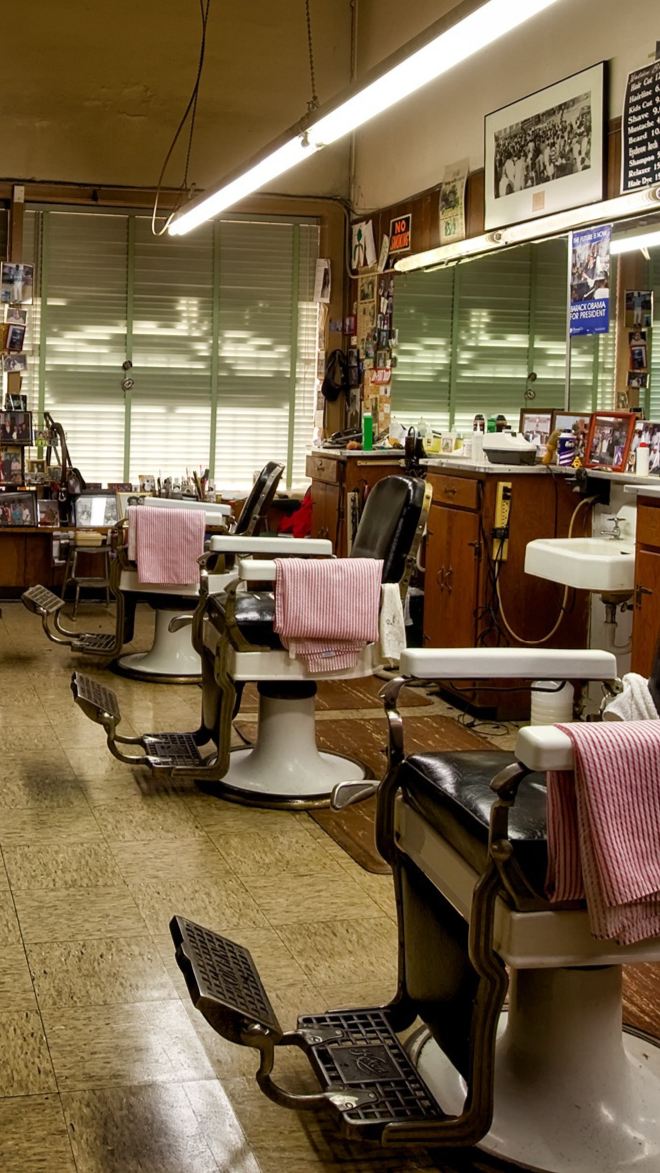 tall image of barber combing hair
